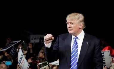 Trump accuses US Justice Dept, says they are trying hard to protect Hillary Trump accuses US Justice Dept, says they are trying hard to protect Hillary