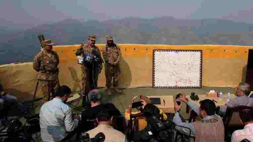 Pakistan army's spokesmen brief journalists at a forward area post in Bhimber Pakistan army's spokesmen brief journalists at a forward area post in Bhimber