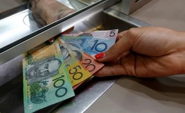 Aussie buoyant, dollar listless as Omicron optimism lifts risky assets Australian dollar