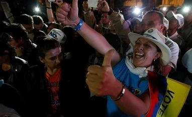 Colombian President Juan Manuel Santos meets rival in race to save peace deal Supporters of "No" vote celebrate after the nation voted "No" in a referendum on a peace deal between the government and Revolutionary Armed Forces of Colombia (FARC) rebels, in Bogota, Colombia. Photo: Reuters