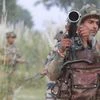 Army soldiers patrol near the highly militarized Line of Control dividing Kashmir between India and Pakistan, in Pallanwal sector, about 75 kilometers from Jammu
