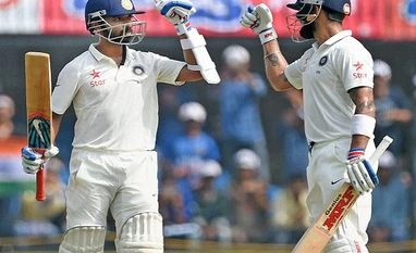 India declare at 557/5 against New Zealand Indian batsman Ajinkya Rahane celebrates his century with skipper Virat Kohli during the third test match against New Zealand in Indore. Photo: PTI