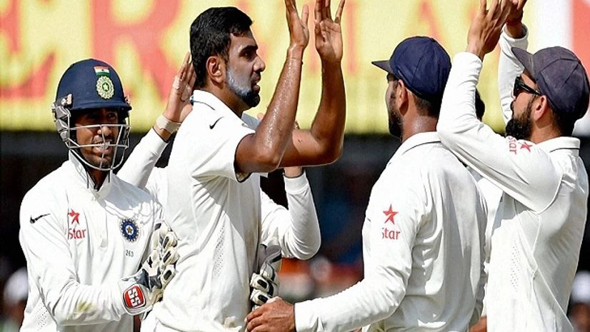 ndian bowler R Ashiwin with Cheteswar Pujara celebrates the wicket of New Zealand batsman Ross Taylor during the 4th day of the third test match in Indore. Photo: PTI ndian bowler R Ashiwin with Cheteswar Pujara celebrates the wicket of New Zealand batsman Ross Taylor during the 4th day of the third test match in Indore. Photo: PTI