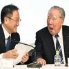 Toyota Motor Corp. President Akio Toyoda, left, and Suzuki Motor Corp. Chairman Osamu Suzuki laugh at each other during a news conference in Tokyo.Photo: AP | PTI