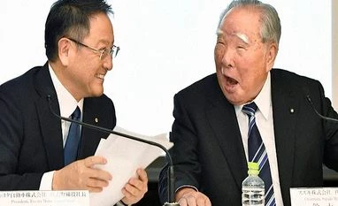 Before Toyota, Suzuki tie-up, motown has seen a string of failed marriages Toyota Motor Corp. President Akio Toyoda, left, and Suzuki Motor Corp. Chairman Osamu Suzuki laugh at each other during a news conference in Tokyo.Photo: AP | PTI