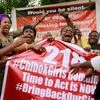 File photo of campaigners reacting to a banner referring to the kidnapping of schoolgirls from Chibok during a sit-out in Abuja, Nigeria. Photo: Reuters