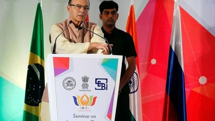 inance Minister Arun Jaitley addresses a gathering at a seminar in Mumbai. Photo: Reuters inance Minister Arun Jaitley addresses a gathering at a seminar in Mumbai. Photo: Reuters