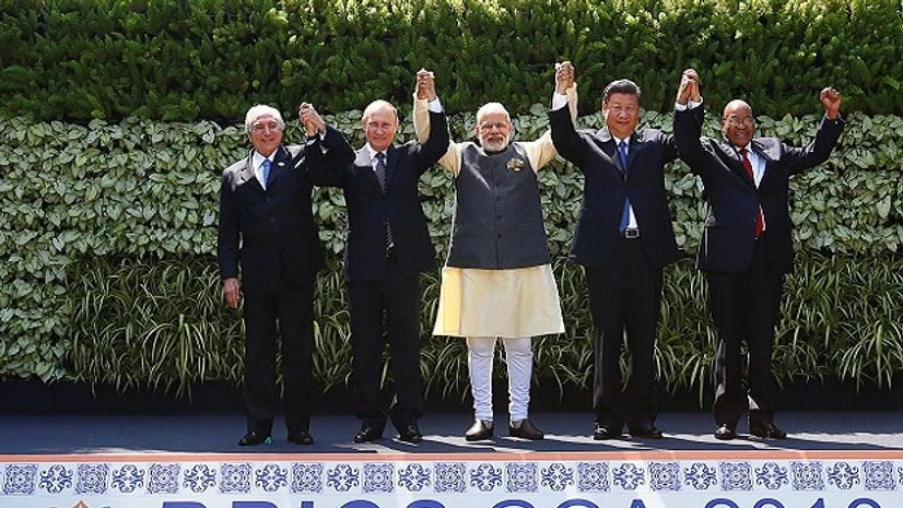 (L-R) Brazil's President Michel Temer, Russian President Vladimir Putin, Indian Prime Minister Narendra Modi, Chinese President Xi Jinping and South African President Jacob Zuma pose for a group picture during BRICS Summit in Benaulim, Goa (L-R) Brazil's President Michel Temer, Russian President Vladimir Putin, Indian Prime Minister Narendra Modi, Chinese President Xi Jinping and South African President Jacob Zuma pose for a group picture during BRICS Summit in Benaulim, Goa