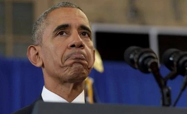 Barack Obama's move to new home underway President Barack Obama pauses while speaking at Benjamin Banneker Academic High School in Washington.Photo:PTI