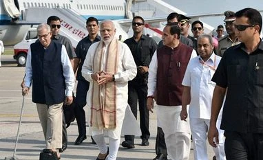 PM Modi warns of 'surgical strikes' against black money, graft Vadodara airport