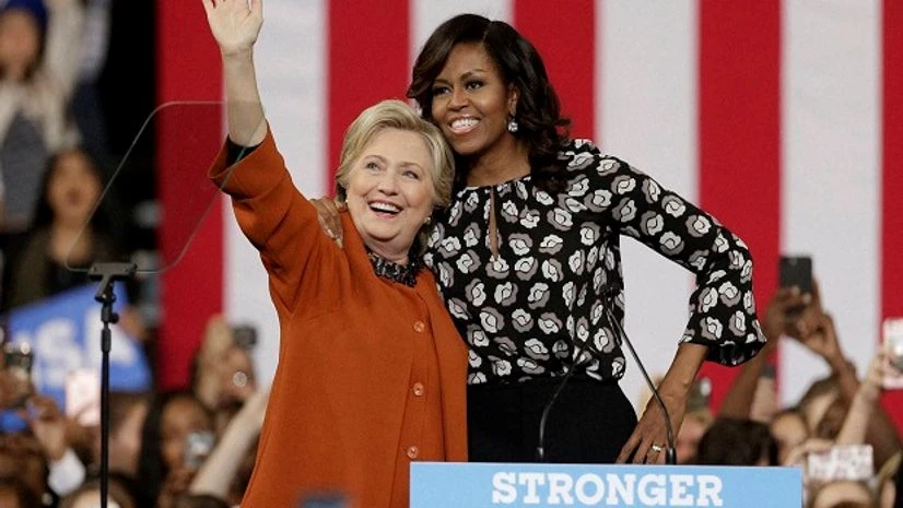 Democratic presidential candidate Hillary Clinton with Michelle Obama during a campaign rally in Winston-Salem Democratic presidential candidate Hillary Clinton with Michelle Obama during a campaign rally in Winston-Salem