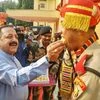 Minister of State at PMO Jitendra Singh offers sweet to BSF jawans during a visit to a border village Rapura in Samba.Photo: PTI