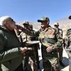 Jawans offer sweets to Prime Minister Narendra Modi on the occassion of Diwali at Sumdo in Himachal Pradesh. Photo: Narendra Modi Twitter Handle