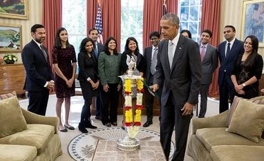 President Barack Obama lighting a lamp in Oval Office (Image: Facebook) President Barack Obama lighting a lamp in Oval Office (Image: Facebook)