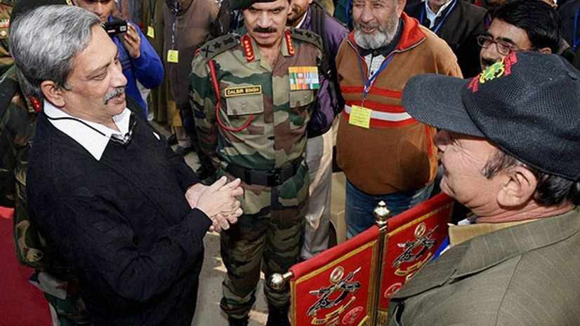 Defence Minister Manohar Parikar along with Army Chief General Dalbir Singh interacts with ex-servicemen after paying tributes to the first Param Vir Chakra recipient Major Somnath Sharma on his 69th death anniversary in Kashmir. (Photo: PTI) Defence Minister Manohar Parikar along with Army Chief General Dalbir Singh interacts with ex-servicemen after paying tributes to the first Param Vir Chakra recipient Major Somnath Sharma on his 69th death anniversary in Kashmir. (Photo: PTI)