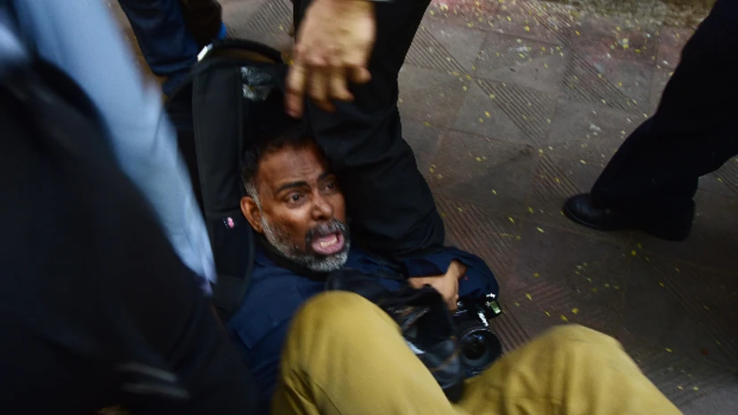 Scenes from Bombay House on Friday during Tata security staff, media scuffle in Mumbai Scenes from Bombay House on Friday during Tata security staff, media scuffle in Mumbai