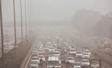 Delhiites can now pay for fancy vehicle numbers online Vehicles ply on the Gurgaon-Delhi Expressway through dense smog in Gurugram on Monday. Photo: PTI