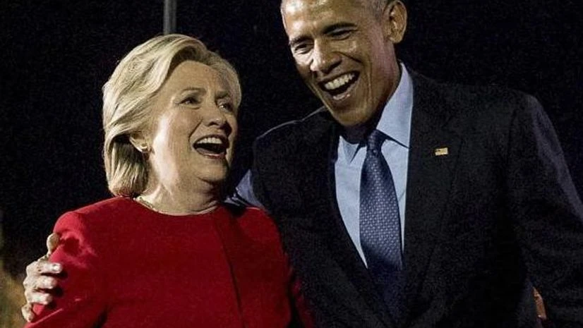 Democratic presidential candidate Hillary Clinton and President Barack Obama walk off stage after speaking at a rally at Independence Mall in Philadelphia.Photo: PTI Democratic presidential candidate Hillary Clinton and President Barack Obama walk off stage after speaking at a rally at Independence Mall in Philadelphia.Photo: PTI