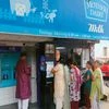 money exchange at milk booths