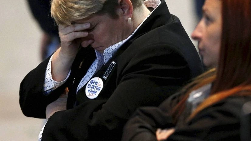 Hillary Clinton supporters react as results come in at an election night party for the Democratic presidential candidate at the Jacob K. Javits Convention Center in New York Hillary Clinton supporters react as results come in at an election night party for the Democratic presidential candidate at the Jacob K. Javits Convention Center in New York