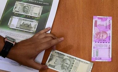 On Nov 8, RBI had only Rs 4.94 lakh cr in 2,000 rupee notes: RTI RBI displays the newly issued rupees 500 and 2000 notes at Reserve Bank of India headquarters in Mumbai