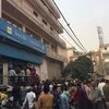 People wait to deposit and withdraw their money outside banks and ATMs (ANI)