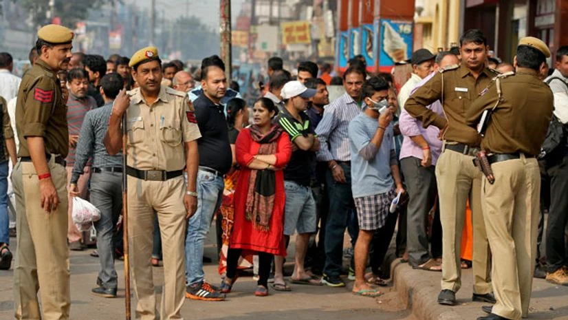 People wait to deposit and withdraw their money outside banks and ATMs (ANI) People wait to deposit and withdraw their money outside banks and ATMs (ANI)