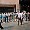 People queue up outside an ATM in New Delhi (Pic: Dalip Kumar)
