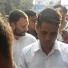 Congress Vice-President Rahul Gandhi waits in queue outside SBI to exchange Rs 4,000.