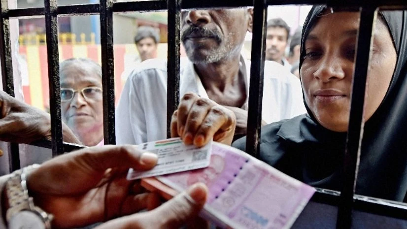 People exchange their old 500 and 1000 rupee notes at special camp organised by a public sector bank in Chennai People exchange their old 500 and 1000 rupee notes at special camp organised by a public sector bank in Chennai