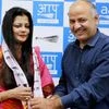 Delhi Dy CM Manish Sishodia welcomes suspended BJP leader and MP Kirti Azad's wife Poonam Azad as she joins Aam Aadmi Party in New Delhi