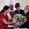 President Pranab Mukherjee reciving a bouquet from  Minister of State for Commerce &amp; Industry (Independent Charge) Nirmala Sitharaman  during the inauguration of the 36th India International Trade Fair (IITF-2016) at Pragati Maidan.Photo:PTI