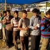 People queue up to vote for Cooch Behar Lok Sabha bypoll. (Photo: ANI)
