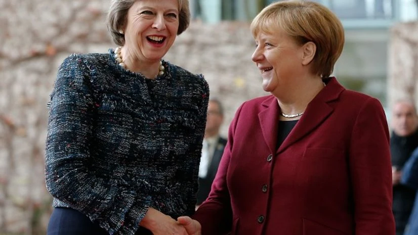 UK Prime Minister Theresa May (left) with German Chancellor Angela Merkel in Berlin on Friday REUTERS UK Prime Minister Theresa May (left) with German Chancellor Angela Merkel in Berlin on Friday REUTERS