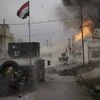A car bomb explodes next to Iraqi special forces armored vehicles as they advance towards Islamic State held territory in Mosul, Iraq