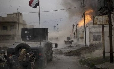 Iraqis find more than 100 bodies from rubble in west Mosul after airstrikes Representative image