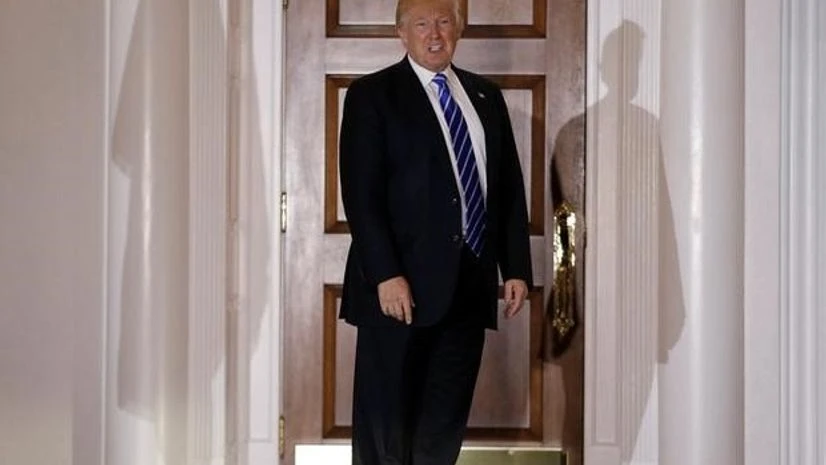 Hundreds protest as swastikas and 'Go Trump' appear in New York park Hundreds protest as swastikas and 'Go Trump' appear in New York park