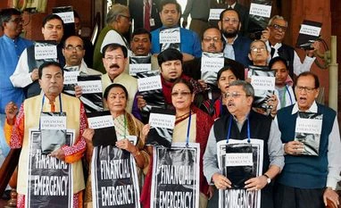Oppn to hold protests outside Parliament over demonetisation TMC members protest at Parliament during the winter session, in New Delhi. (Photo: PTI)