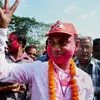 CPI(M)'s Jhumu Sarkar celebrates victory in assembly bypolls at Barjala constituency in Agartala on Tuesday.