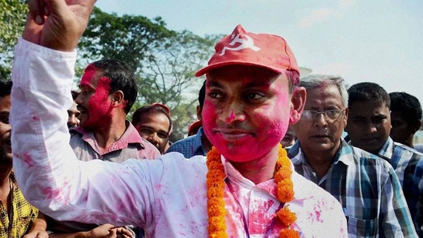 CPI(M)'s Jhumu Sarkar celebrates victory in assembly bypolls at Barjala constituency in Agartala on Tuesday. CPI(M)'s Jhumu Sarkar celebrates victory in assembly bypolls at Barjala constituency in Agartala on Tuesday.