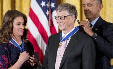 Obama honours Bill, Melinda Gates with Medal of Freedom award File photo of President Barack Obama, accompanied by Melinda Gates (left), presenting the Presidential Medal of Freedom to Bill Gates (centre). (Photo: PTI)