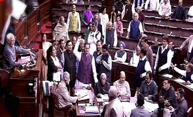 Demonetisation: Opposition protests in Rajya Sabha, proceedings disrupted Opposition members protest in the Rajya Sabha in New Delhi. Photo: PTI