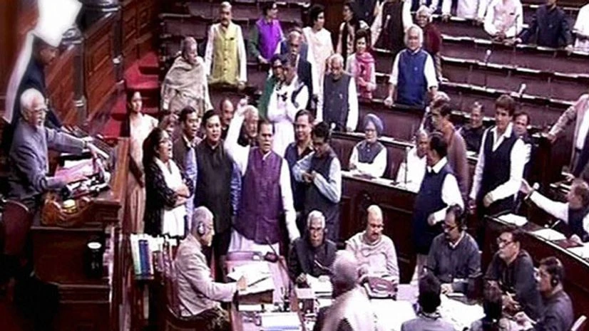 Opposition members protest in the Rajya Sabha in New Delhi. Photo: PTI Opposition members protest in the Rajya Sabha in New Delhi. Photo: PTI