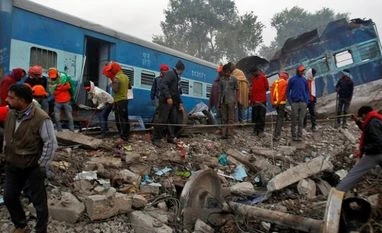 Two more attempts to derail trains prevented Rescue workers search for survivors at the site of Sunday's train derailment in Pukhrayan, south of Kanpur