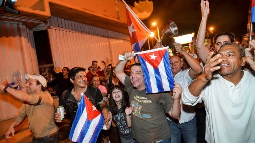 The Cuban community in Miami celebrates the announcement of Fidel Castro's death Castro