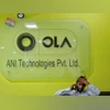 An employee speaks over his phone as he sits at the front desk inside the office of Ola cab service in Gurugram (Photo: Reuters) An employee speaks over his phone as he sits at the front desk inside the office of Ola cab service in Gurugram (Photo: Reuters)