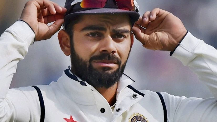 Virat Kohli Indian skipper Virat Kohli on the fourth day of the third Test match between India and England in Mohali. <b>Photo: PTI</b>