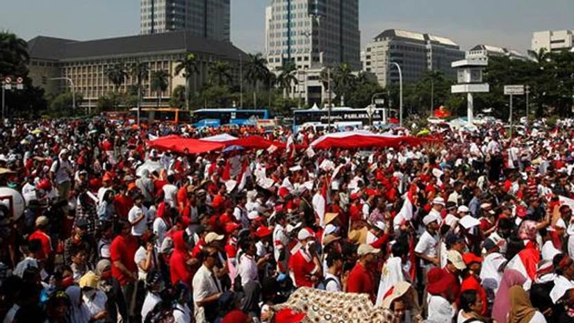People take part in a rally against what they see as growing racial and religious intolerance in the world’s largest Muslim-majority country in Jakarta People take part in a rally against what they see as growing racial and religious intolerance in the world’s largest Muslim-majority country in Jakarta