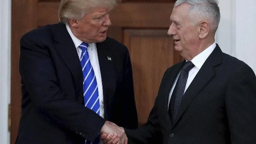 President-elect Donald Trump shakes hands with retired Marine Corps Gen. James Mattis <b>File photo</b> President-elect Donald Trump shakes hands with retired Marine Corps Gen. James Mattis <b>File photo</b>