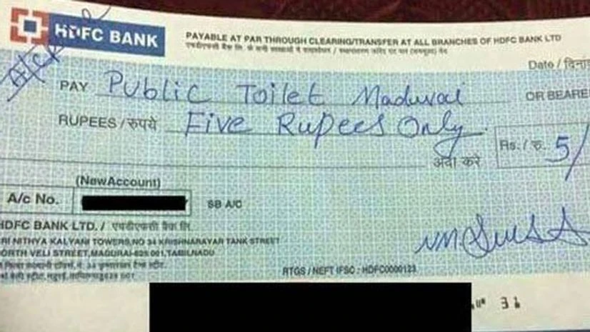 A picture of the cheque addressed to the 'Public Toilet Madurai' with 'Five Rupees Only' written quite clearly was shared by a Facebook user A picture of the cheque addressed to the 'Public Toilet Madurai' with 'Five Rupees Only' written quite clearly was shared by a Facebook user